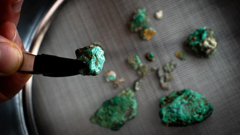 A child's tooth and strange green stones uncover a 5,500-year-old mystery