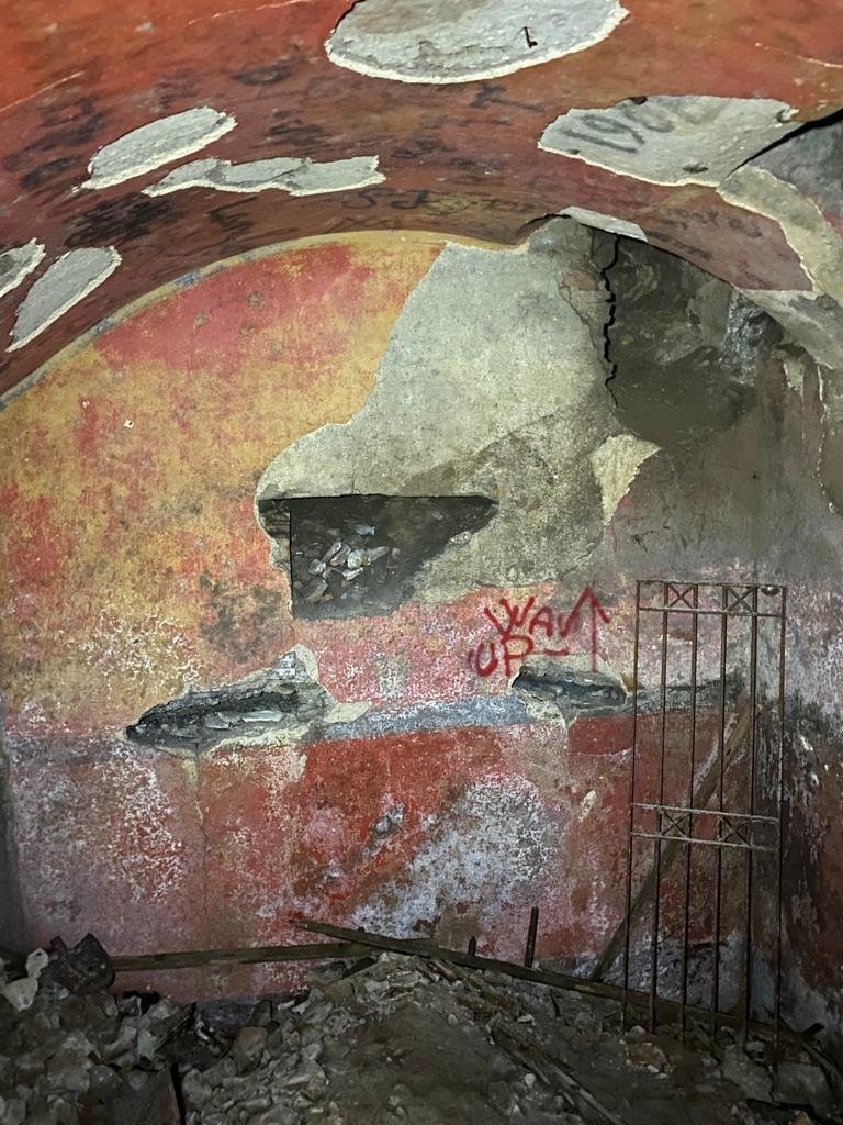 Painted walls of the vaulted room of a Roman house in Rome, Italy