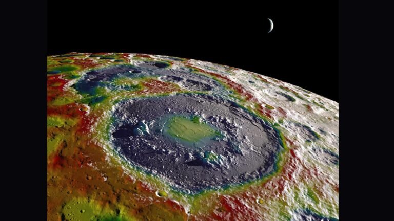 A heat map of the surface of the moon showing a large dark blue circle of a meteorite crater