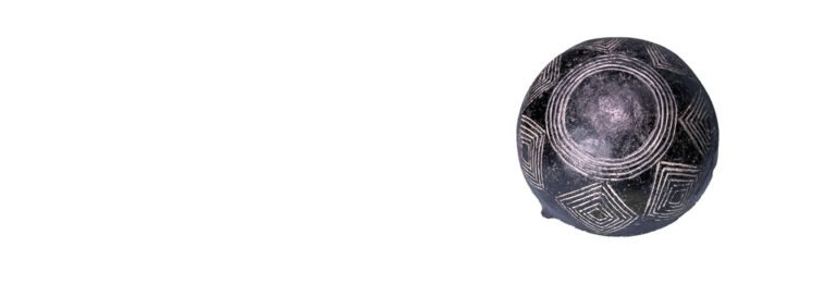 Bottom of Black Polished ware hemispherical bowl with incised decoration