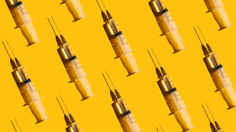 Pattern of syringes with a vaccine on yellow background. Concept of medical treatment or vaccination.